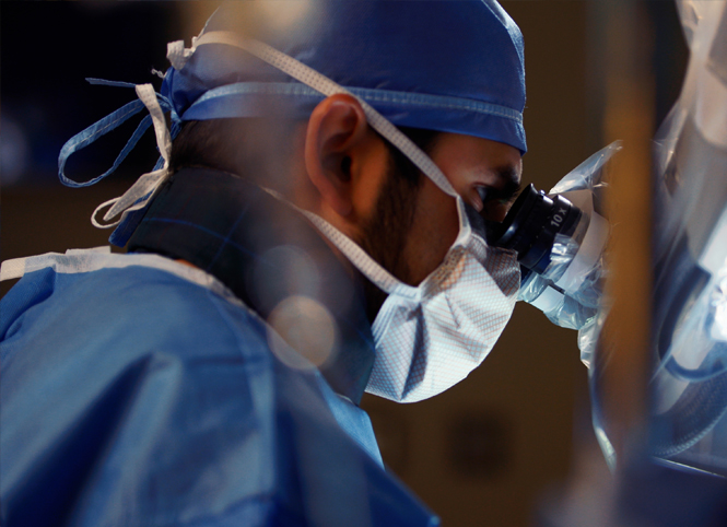 A Christ Hospital Health Network medical professional performing surgery &ldquo;#1 hospital in the Cincinnati Region (U.S. News & World Report)&rdquo;